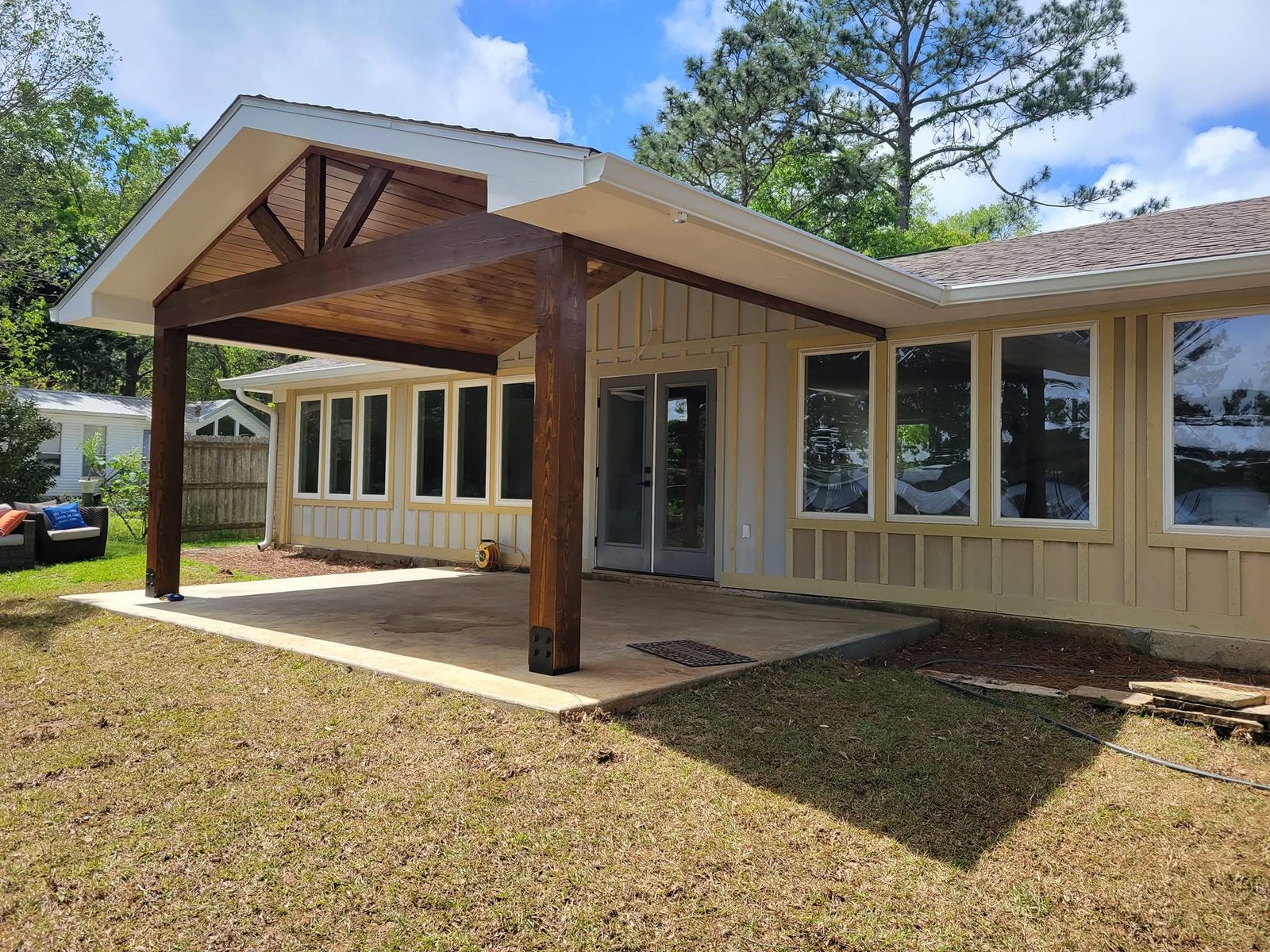 Timber-frame covered patio addition built by R D Fuller Construction